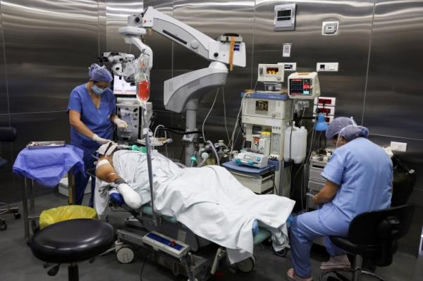 An injured man undergoes an operation, following pager detonations across Lebanon, at a hospital in Beirut, Lebanon September 18, 2024.